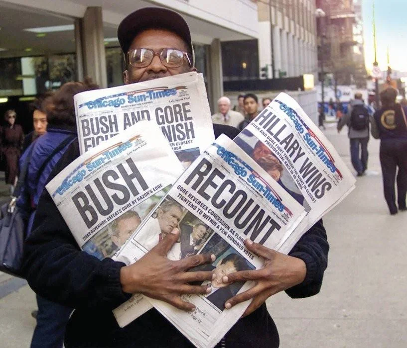 DÚVIDA - Notícias de Chicago em 2000: caos no duelo Al Gore x Bush
